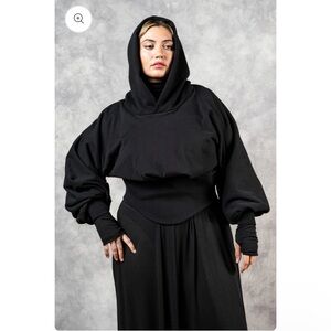 Nuit Clothing Atelier Corset Waist Hoodie

A Bishop Sleeve Cropped Hoodie